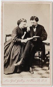 256px-Photograph_of_a_man_and_a_woman_reading_a_book